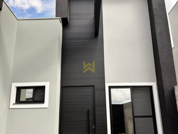 Fachada Imponente de casa à venda em Vilhena - RO, com arquitetura contemporânea, iluminação natural e acabamento premium — Wender Imóveis.