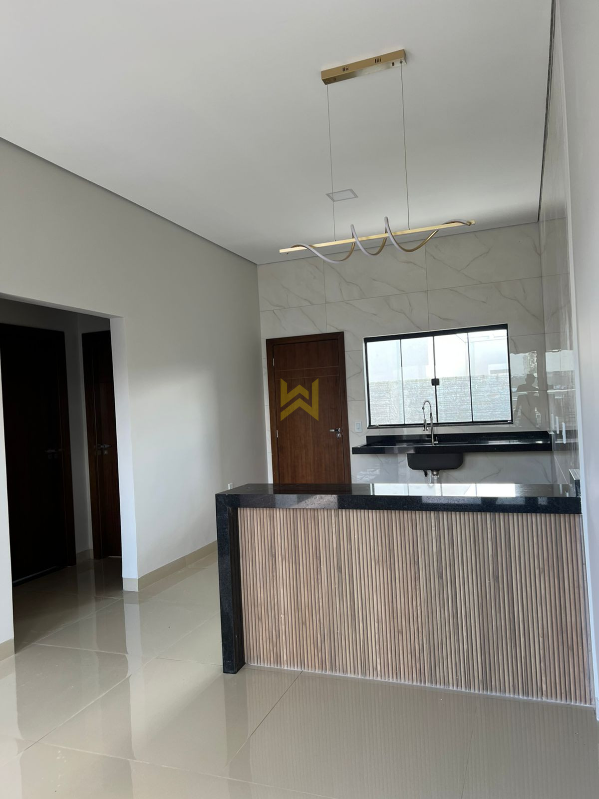 Cozinha gourmet moderna com bancada Cozinha gourmet moderna com bancada em ilha e acabamento de alto padrão em Vilhena-RO